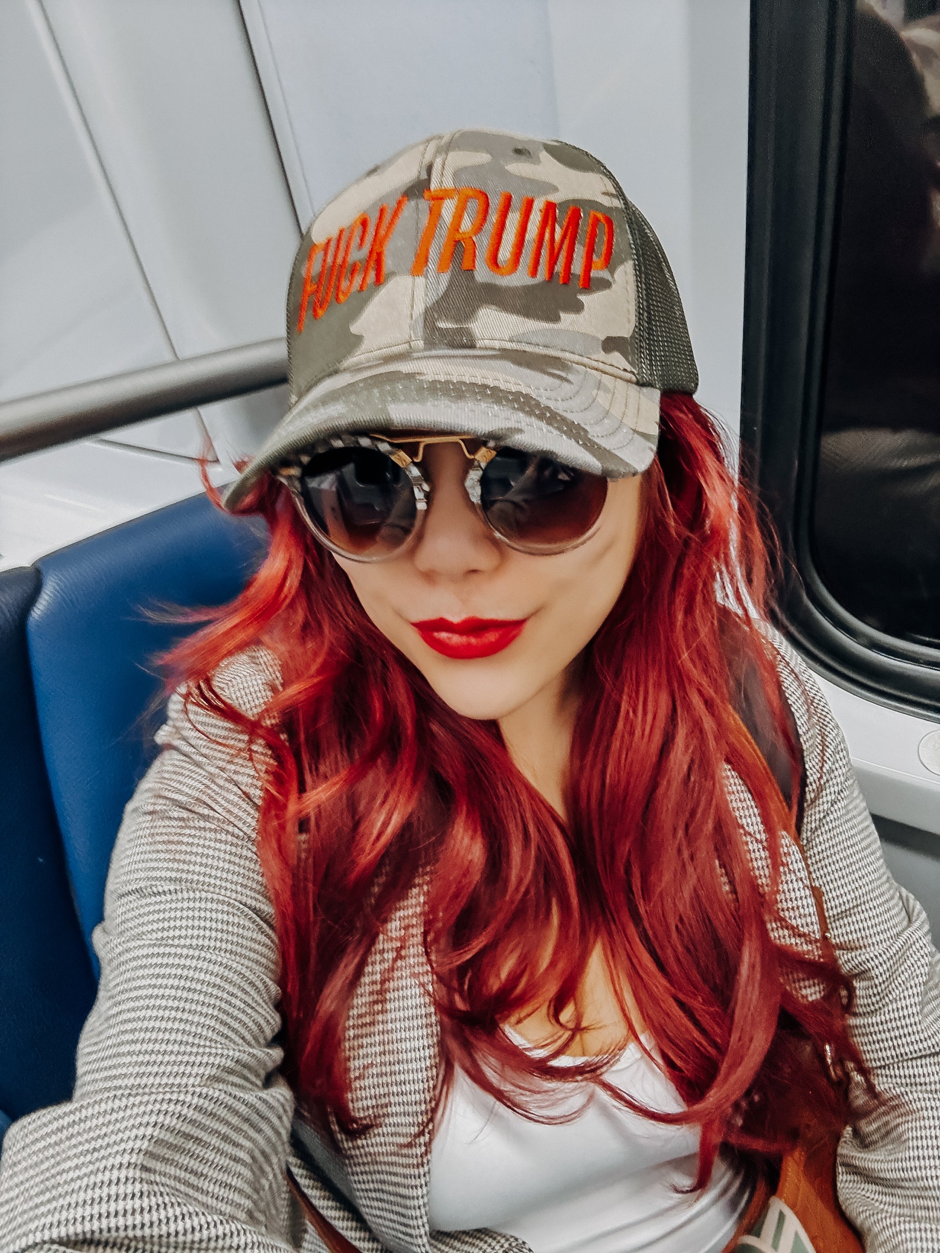FUCK TRUMP Camo Trucker Hat with Embroidery