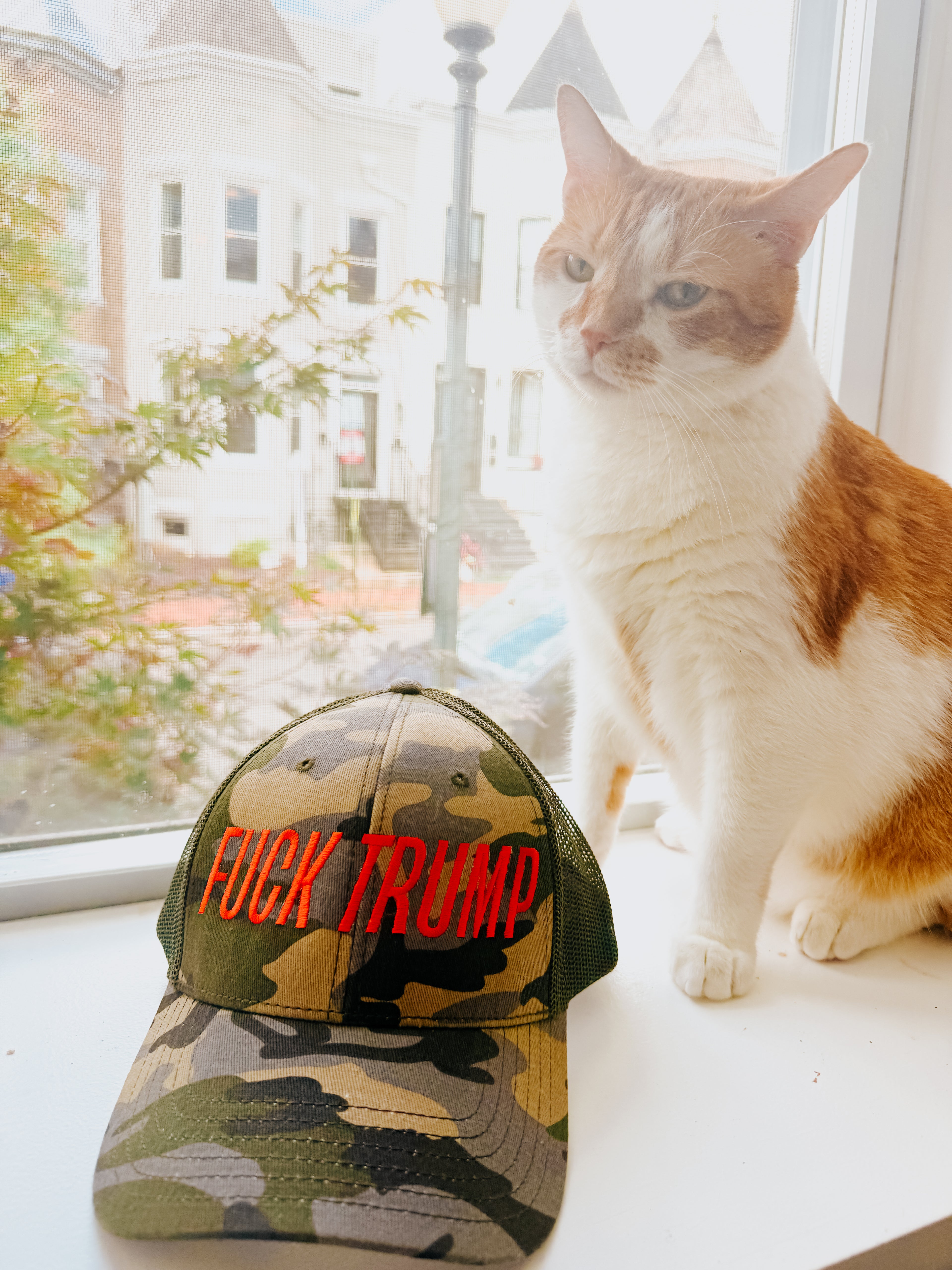 FUCK TRUMP Camo Trucker Hat with Embroidery