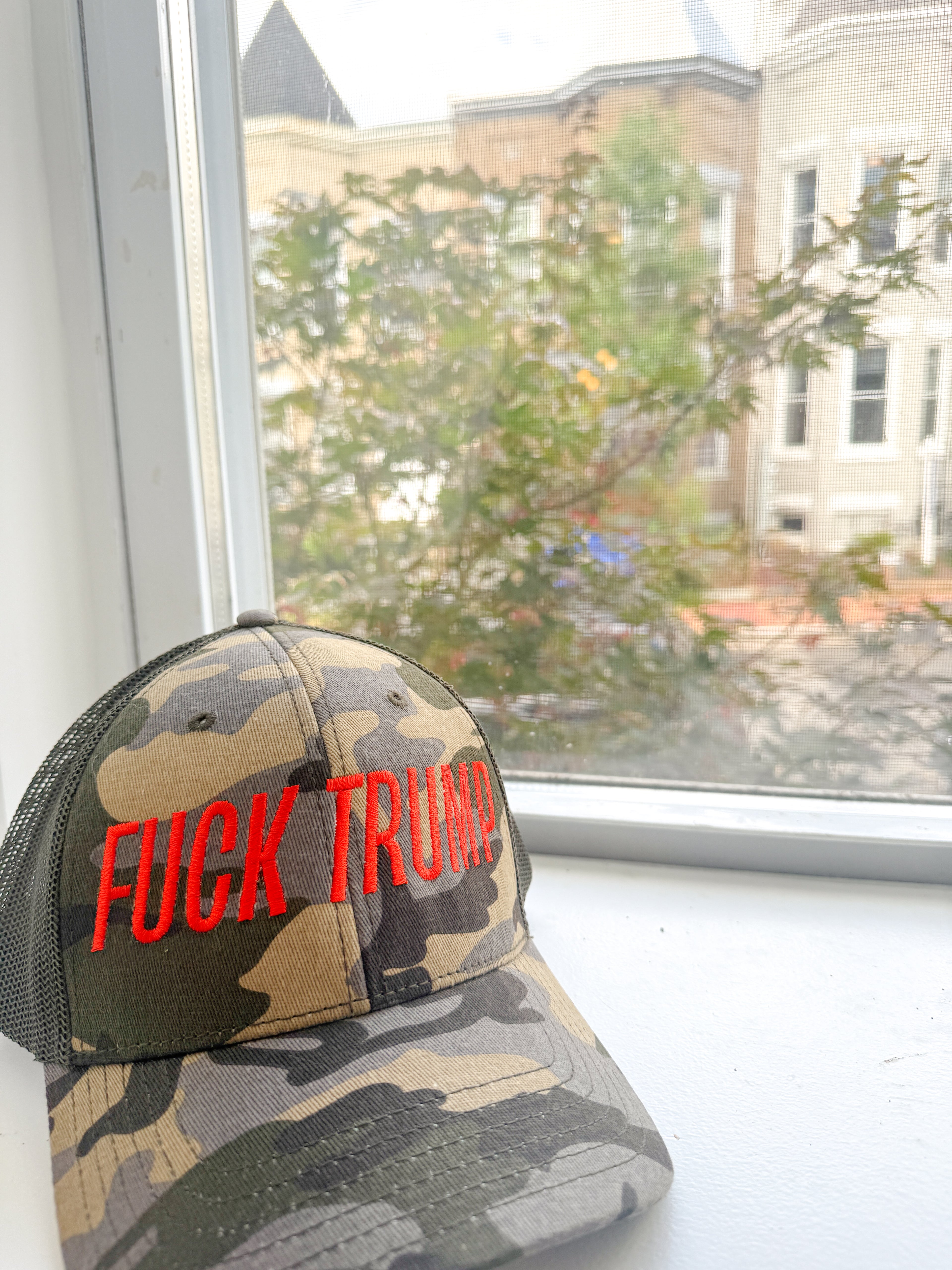 FUCK TRUMP Camo Trucker Hat with Embroidery