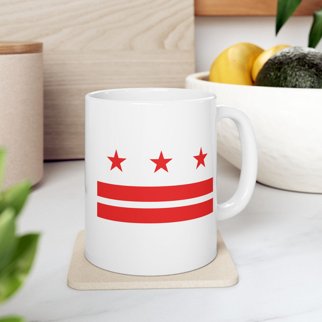 Show your Washington DC local pride with this classic white ceramic coffee mug. One side with the standard DC flag design, and the other with FREE DC repeated. We can't say it enough! Perfect for enjoying your covfefe white arguing with people on the internet.